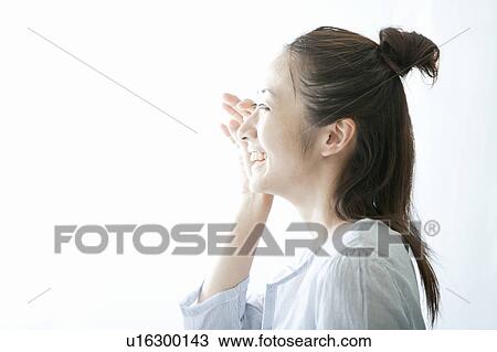 Woman wiping her face with her hand, Tokyo Prefecture, Japan View Large Photo Image Stock Image - Woman wiping her face with her hand, Tokyo Prefecture, Japan. Fotosearch