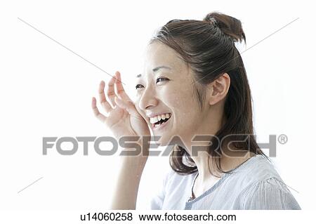 Woman wiping her face with her hand, Tokyo Prefecture, Japan View Large Photo Image Stock Photo - Woman wiping her face with her hand, Tokyo Prefecture, Japan. Fotosearch