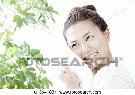 Woman wiping her face with towel, Tokyo Prefecture, Honshu, Japan View Large Photo Image Stock Photo - Woman wiping her face with towel, Tokyo Prefecture, Honshu, Japan. Fotosearch