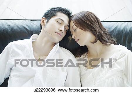 Young Couple Head to Head View Large Photo Image Stock Photograph - Young Couple Head to Head. Fotosearch