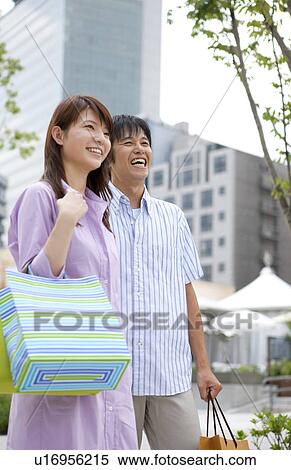 Young Couple Laughing View Large Photo Image Stock Photography - Young Couple Laughing. Fotosearch