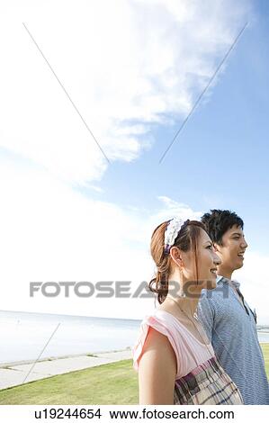 Picture - Young Couple on Beach. Fotosearch