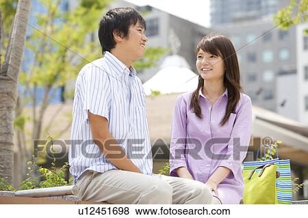 Young Couple with Shopping Bags View Large Photo Image Stock Photo - Young Couple with Shopping Bags. Fotosearch