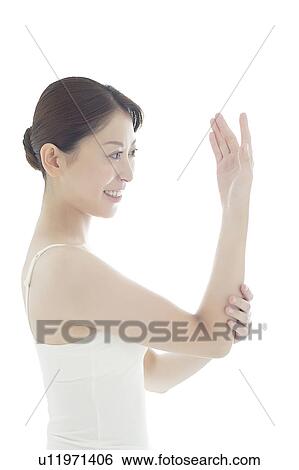 Young Woman Caring For Her Hands View Large Photo Image Stock Photograph - Young Woman Caring For Her Hands. Fotosearch