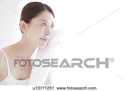 Young Woman Drying Her Face View Large Photo Image Stock Image - Young Woman Drying Her Face. Fotosearch