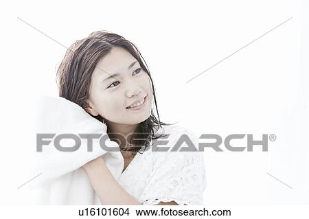 Young woman drying her hair with towel, Tokyo Prefecture, Honshu, Japan View Large Photo Image Picture - Young woman drying her hair with towel, Tokyo Prefecture, Honshu, Japan. Fotosearch