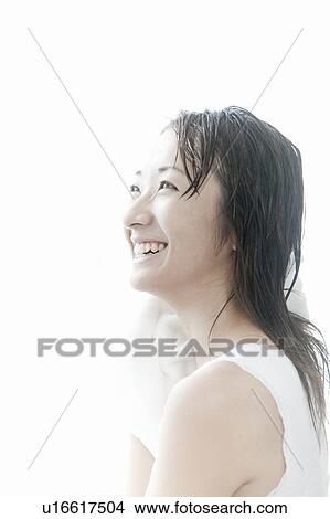 Young woman drying her hair with towel, Tokyo Prefecture, Japan View Large Photo Image Picture - Young woman drying her hair with towel, Tokyo Prefecture, Japan. Fotosearch