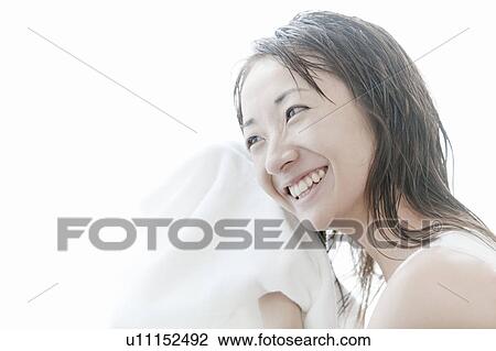 Young woman drying her hair with towel, Tokyo Prefecture, Japan View Large Photo Image Stock Image - Young woman drying her hair with towel, Tokyo Prefecture, Japan. Fotosearch