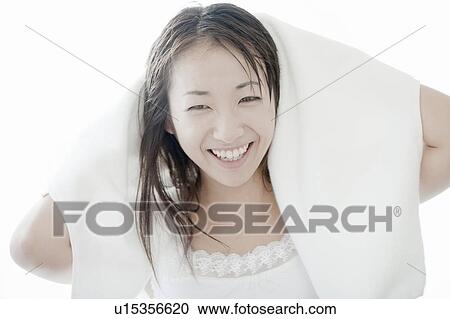 Young woman drying her hair with towel, Tokyo Prefecture, Japan View Large Photo Image Stock Image - Young woman drying her hair with towel, Tokyo Prefecture, Japan. Fotosearch