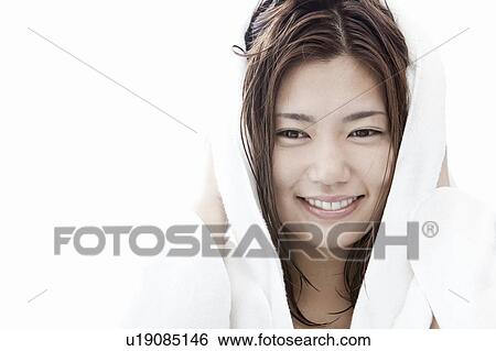 Young woman drying her hair with towel, Tokyo Prefecture, Honshu, Japan View Large Photo Image Stock Photograph - Young woman drying her hair with towel, Tokyo Prefecture, Honshu, Japan. Fotosearch