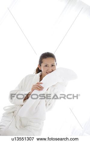 Stock Photo - Young Woman Drying Herself with Towel. Fotosearch
