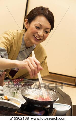 Young Woman Eating View Large Photo Image Stock Photo - Young Woman Eating. Fotosearch