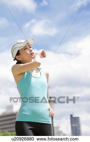 Young Woman Exercising View Large Photo Image Stock Image - Young Woman Exercising. Fotosearch