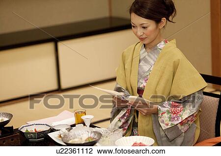 Young Woman Having Dinner View Large Photo Image Stock Image - Young Woman Having Dinner. Fotosearch