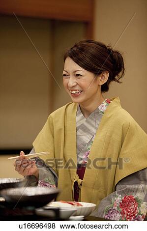 Young Woman Having Dinner View Large Photo Image Stock Photo - Young Woman Having Dinner. Fotosearch