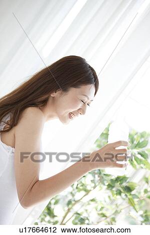 Young Woman Having Water View Large Photo Image Stock Image - Young Woman Having Water. Fotosearch