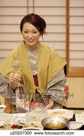 Young Woman Having White Wine with Dinner View Large Photo Image Stock Image - Young Woman Having White Wine with Dinner. Fotosearch