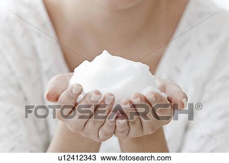 Young woman holding soap suds, Tokyo Prefecture, Honshu, Japan View Large Photo Image Stock Image - Young woman holding soap suds, Tokyo Prefecture, Honshu, Japan. Fotosearch