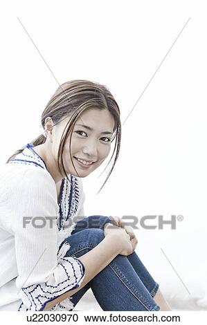 Young Woman looking at camera, Tokyo Prefecture, Honshu, Japan View Large Photo Image Stock Image - Young Woman looking at camera, Tokyo Prefecture, Honshu, Japan. Fotosearch
