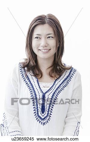 Young woman looking away, Tokyo Prefecture, Honshu, Japan View Large Photo Image Stock Photography - Young woman looking away, Tokyo Prefecture, Honshu, Japan. Fotosearch