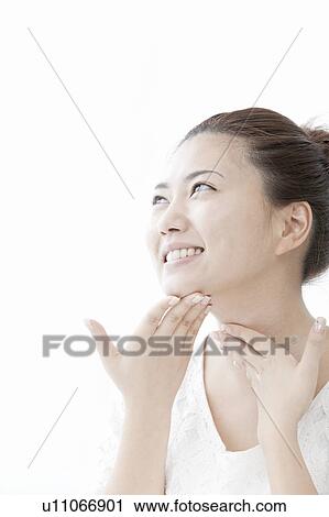Young woman massaging her neck, Tokyo Prefecture, Honshu, Japan View Large Photo Image Stock Image - Young woman massaging her neck, Tokyo Prefecture, Honshu, Japan. Fotosearch