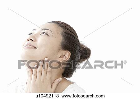 Young woman massaging her neck, Tokyo Prefecture, Honshu, Japan View Large Photo Image Stock Photo - Young woman massaging her neck, Tokyo Prefecture, Honshu, Japan. Fotosearch