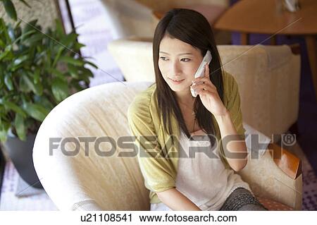 Young Woman On Phone View Large Photo Image Stock Image - Young Woman On Phone. Fotosearch