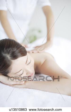 Young Woman Receiving Massage View Large Photo Image Stock Image - Young Woman Receiving Massage. Fotosearch