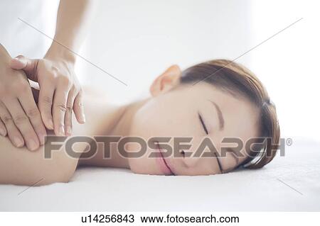 Young Woman Receiving Massage View Large Photo Image Stock Image - Young Woman Receiving Massage. Fotosearch