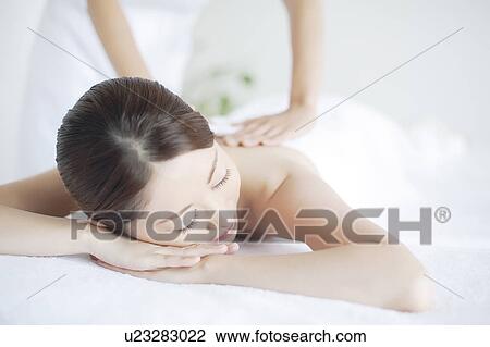 Young Woman Receiving Massage View Large Photo Image Stock Image - Young Woman Receiving Massage. Fotosearch