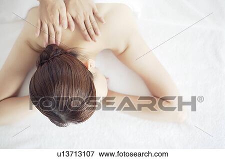 Young Woman Receiving Massage View Large Photo Image Stock Photo - Young Woman Receiving Massage. Fotosearch