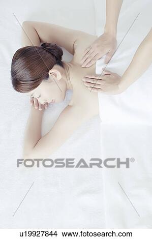 Young Woman Receiving Massaging View Large Photo Image Picture - Young Woman Receiving Massaging. Fotosearch