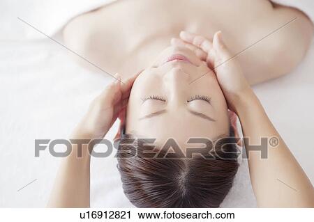 Young Woman Receiving Massaging View Large Photo Image Stock Image - Young Woman Receiving Massaging. Fotosearch