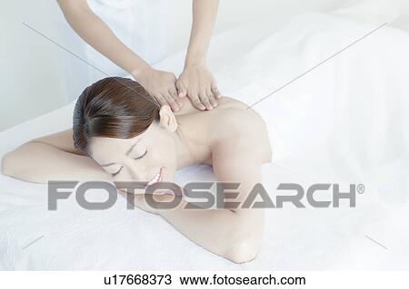 Young Woman Receiving Massaging View Large Photo Image Stock Image - Young Woman Receiving Massaging. Fotosearch