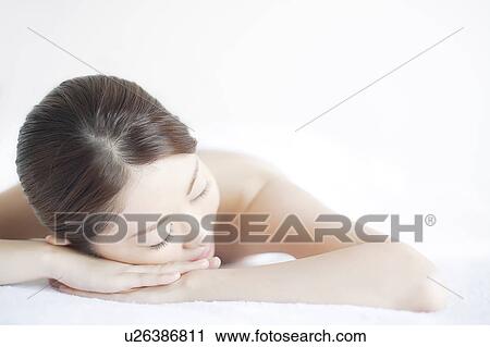 Stock Image - Young Woman Resting. Fotosearch