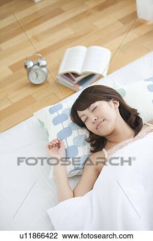 Young Woman Sleeping in Bed View Large Photo Image Stock Image - Young Woman Sleeping in Bed. Fotosearch