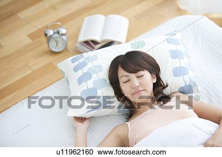 Young Woman Sleeping in Bed View Large Photo Image Stock Image - Young Woman Sleeping in Bed. Fotosearch