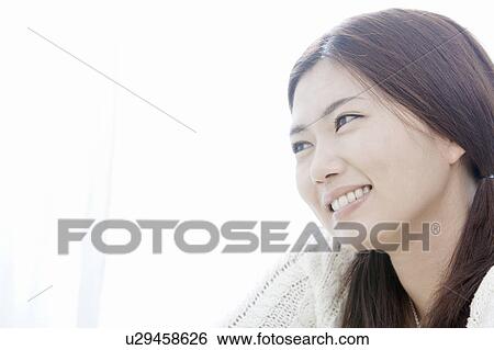 Young woman smiling, Tokyo Prefecture, Honshu, Japan View Large Photo Image Stock Photograph - Young woman smiling, Tokyo Prefecture, Honshu, Japan. Fotosearch