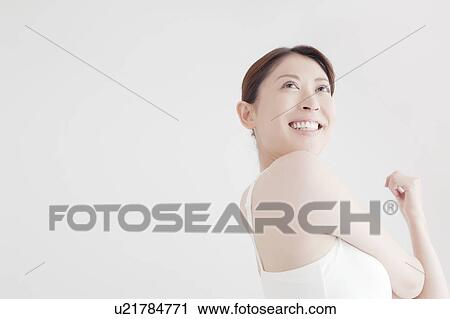 Stock Image - Young Woman Stretching. Fotosearch