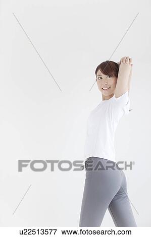 Young Woman Stretching View Large Photo Image Stock Photo - Young Woman Stretching. Fotosearch