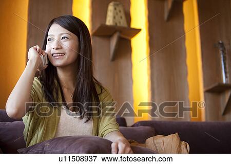 Young Woman Talking On Phone View Large Photo Image Stock Photo - Young Woman Talking On Phone. Fotosearch