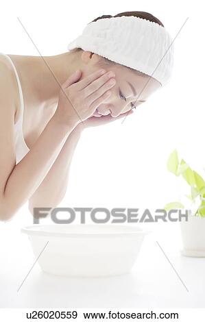Young Woman Washing Face View Large Photo Image Stock Photo - Young Woman Washing Face. Fotosearch