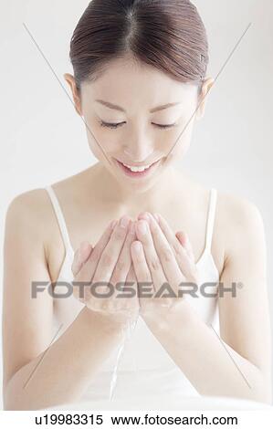 Young Woman Washing Face View Large Photo Image Stock Photography - Young Woman Washing Face. Fotosearch