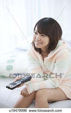 Young Woman Watching TV View Large Photo Image Stock Photograph - Young Woman Watching TV. Fotosearch