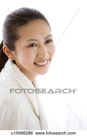 Stock Photograph - Young Woman Wearing Bathrobe. Fotosearch
