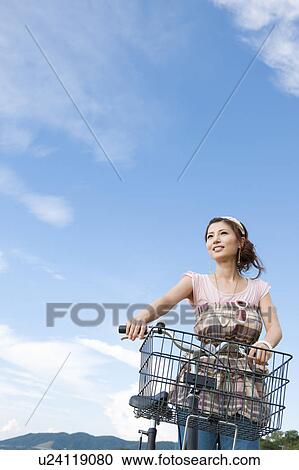 Young Woman with Bicycle View Large Photo Image Stock Image - Young Woman with Bicycle. Fotosearch