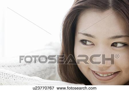 Young woman with head in hands, Tokyo Prefecture, Honshu, Japan View Large Photo Image Stock Photo - Young woman with head in hands, Tokyo Prefecture, Honshu, Japan. Fotosearch
