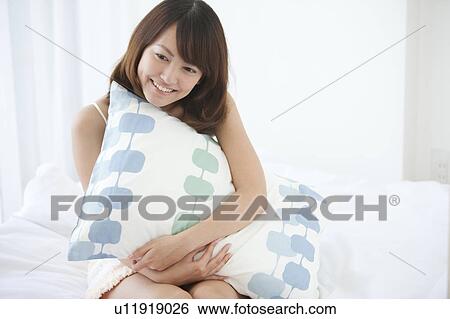 Young Woman with Pillow View Large Photo Image Stock Photograph - Young Woman with Pillow. Fotosearch