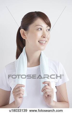 Young Woman with Towel Around Her Neck View Large Photo Image Stock Photo - Young Woman with Towel Around Her Neck. Fotosearch