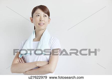 Young Woman With Towel Around Neck View Large Photo Image Stock Photo - Young Woman With Towel Around Neck. Fotosearch